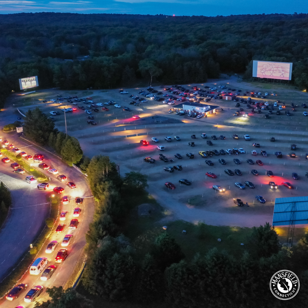 Aerial view of cars arriving at Mansfield Drive-In Theatre at dusk
